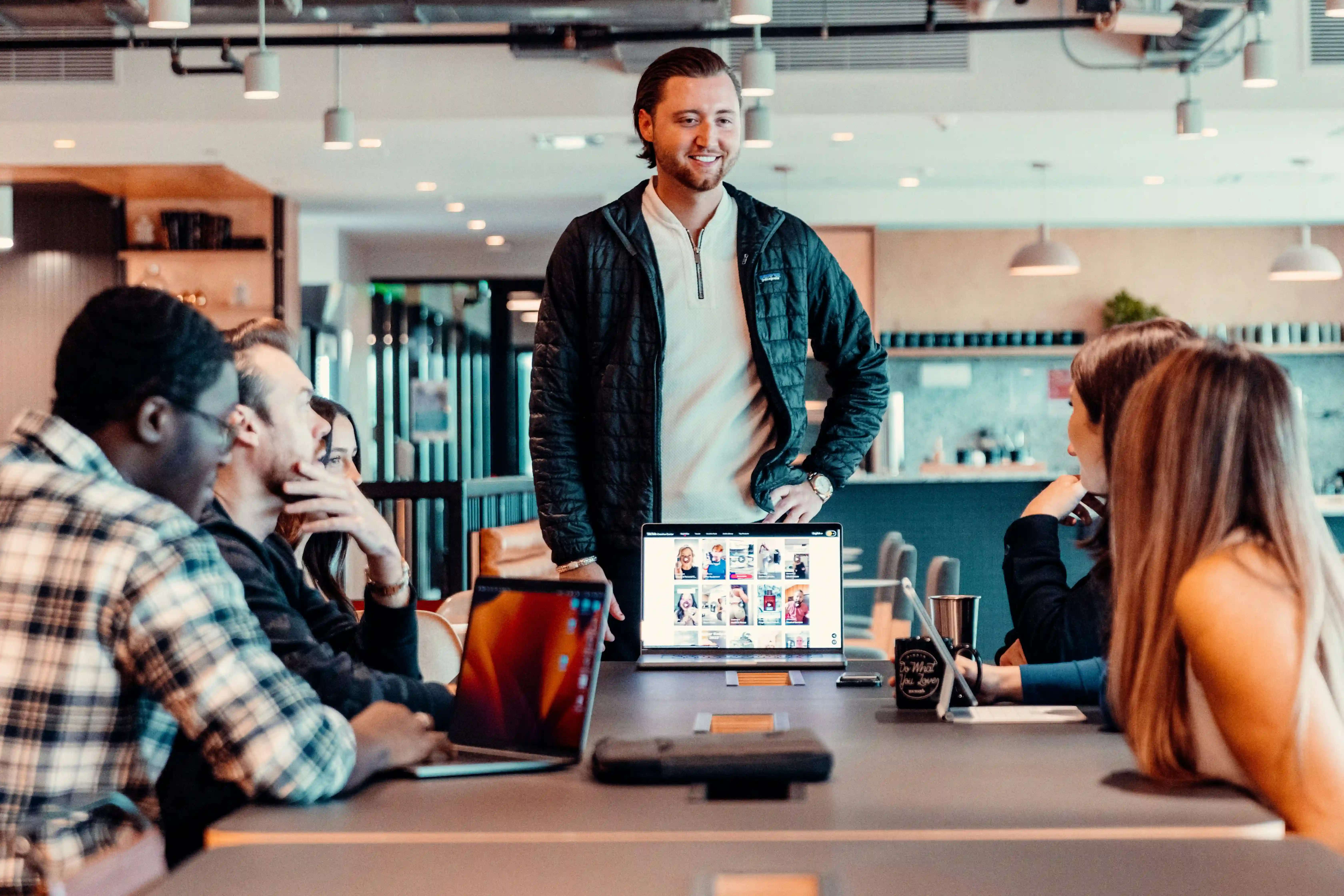 Agency team using a dashboard for automated social media reports and AI-driven social listening insights.